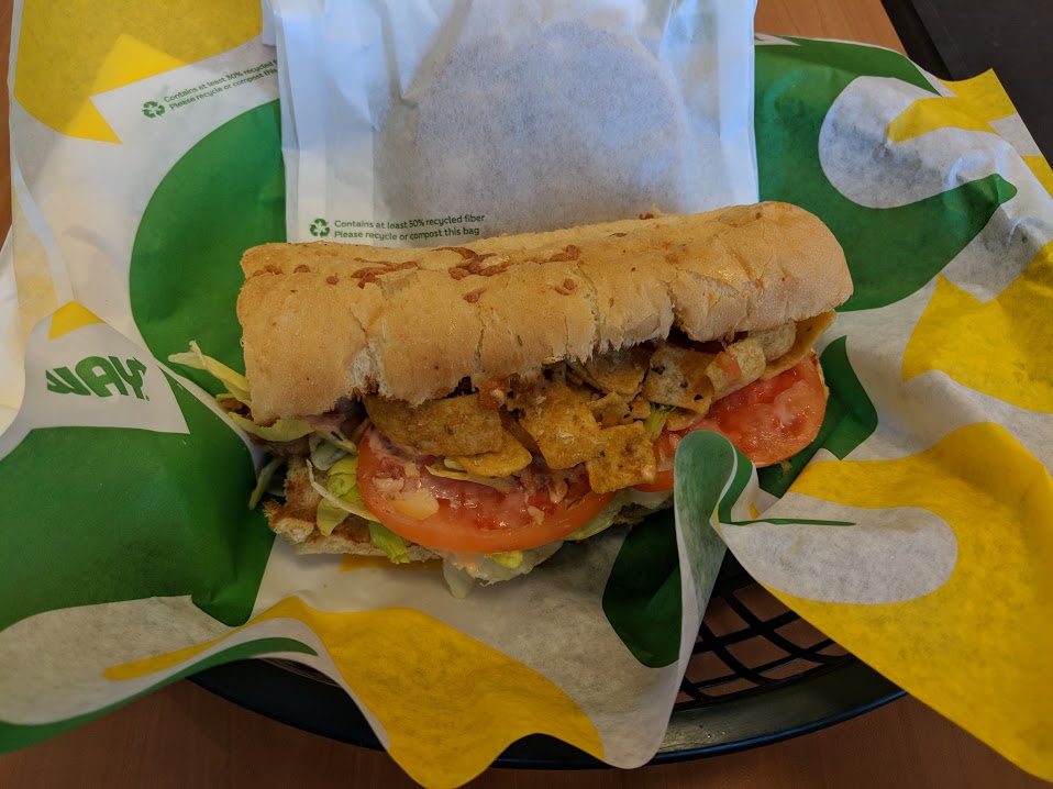 Subway’s Fritos Chicken Enchilada Melt requires a fork or an entire old growth forest worth of napkins